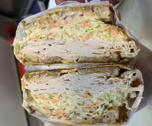 Our inside out “Joe” house roasted turkey, bread, slaw Russian made in house. Swiss griddled to the outside for a crisp bite 